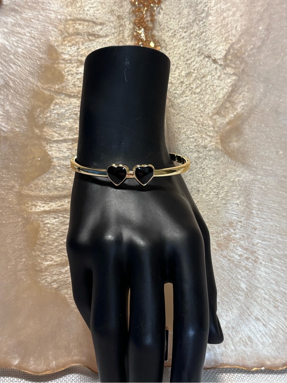 Gold Bangle Bracelet with Black Heart Accents